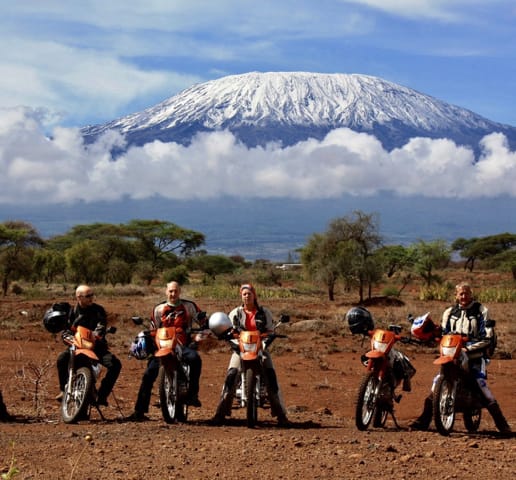 Riders on the plains below Kilimanjaro